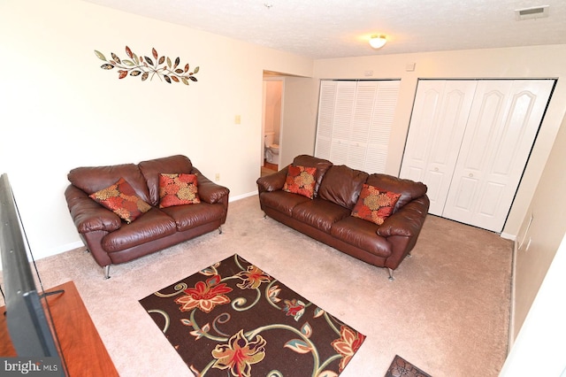 living room with light colored carpet