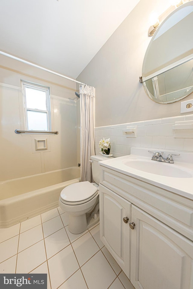 full bathroom with toilet, tile walls, vanity, shower / bathtub combination with curtain, and tile patterned flooring