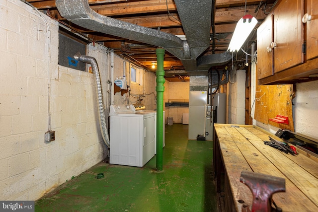 basement with washing machine and clothes dryer