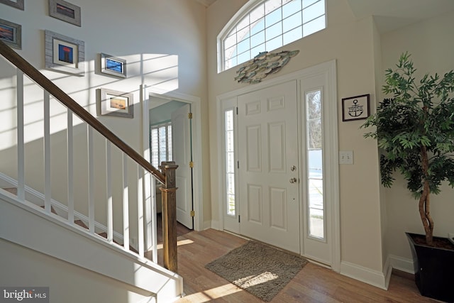 entryway with light hardwood / wood-style floors