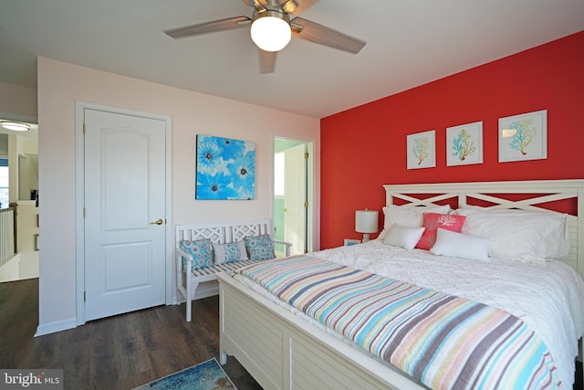 bedroom featuring ceiling fan and dark hardwood / wood-style flooring