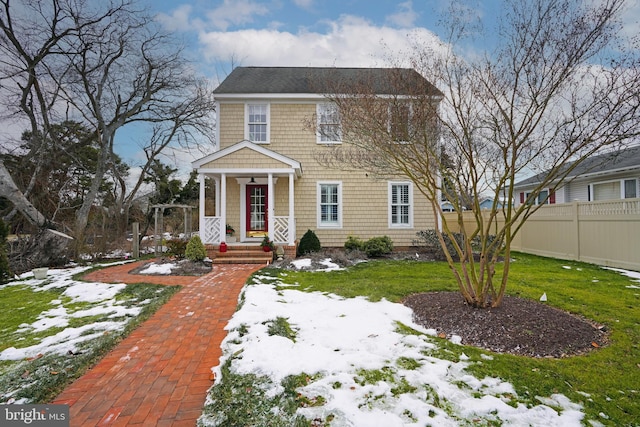 view of front of house with a yard