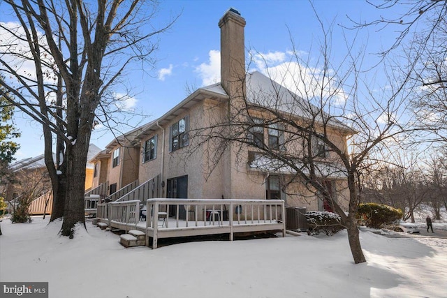 exterior space featuring a deck and central air condition unit