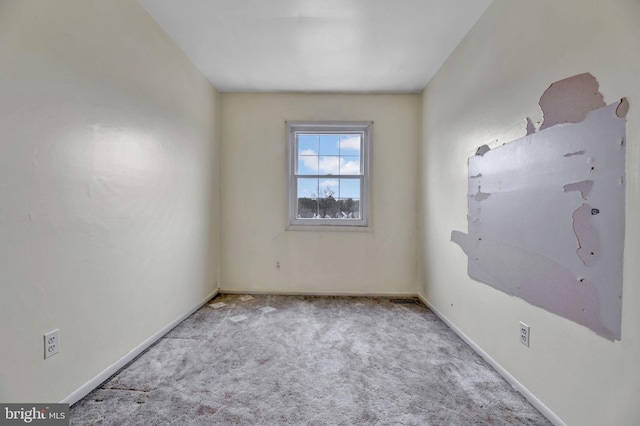 view of carpeted spare room