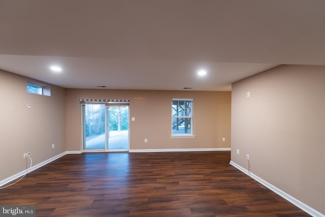 empty room featuring dark hardwood / wood-style floors