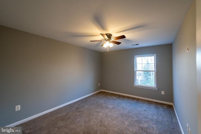 unfurnished room featuring carpet floors and ceiling fan