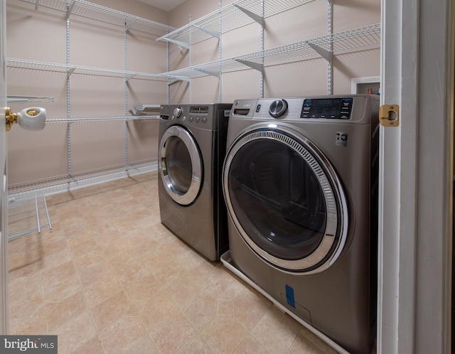 laundry area featuring separate washer and dryer