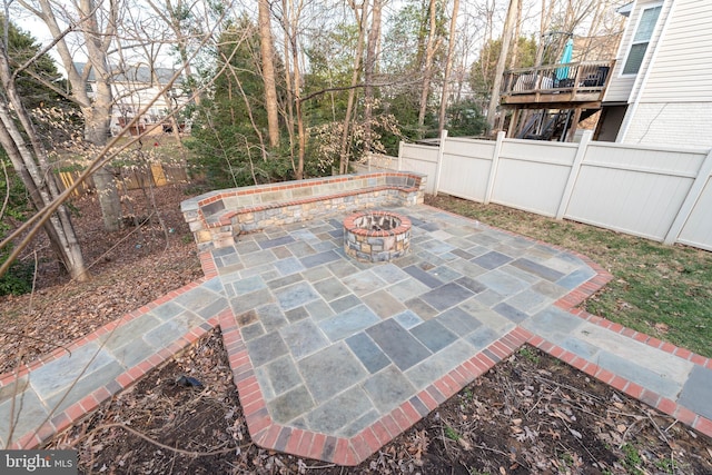 view of patio featuring an outdoor fire pit