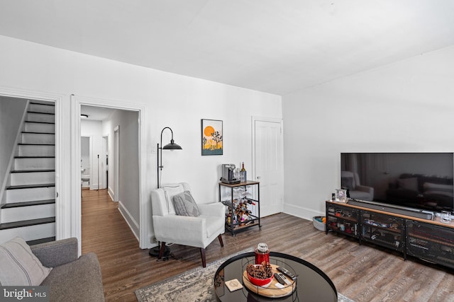 living room featuring dark hardwood / wood-style flooring