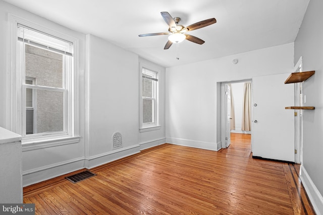 interior space with light hardwood / wood-style floors and ceiling fan