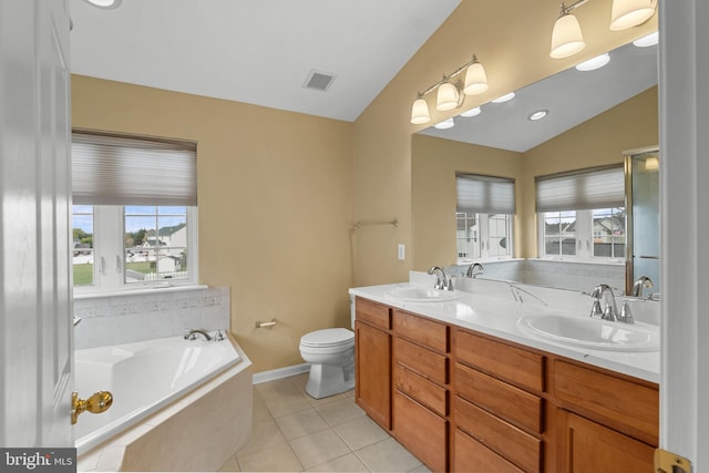 99 Trumpeter Swan Way, Magnolia, DE 19962 - full bathroom with vaulted ceiling, healthy amount of natural light, a bath, tile patterned flooring, and double vanity