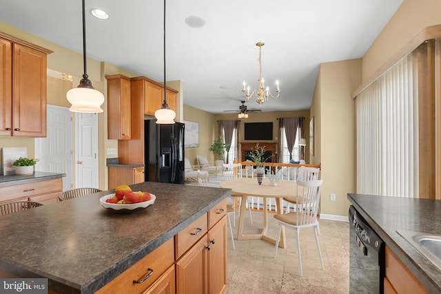 99 Trumpeter Swan Way, Magnolia, DE 19962 - kitchen featuring black appliances, dark countertops, ceiling fan, a chandelier, and open floor plan