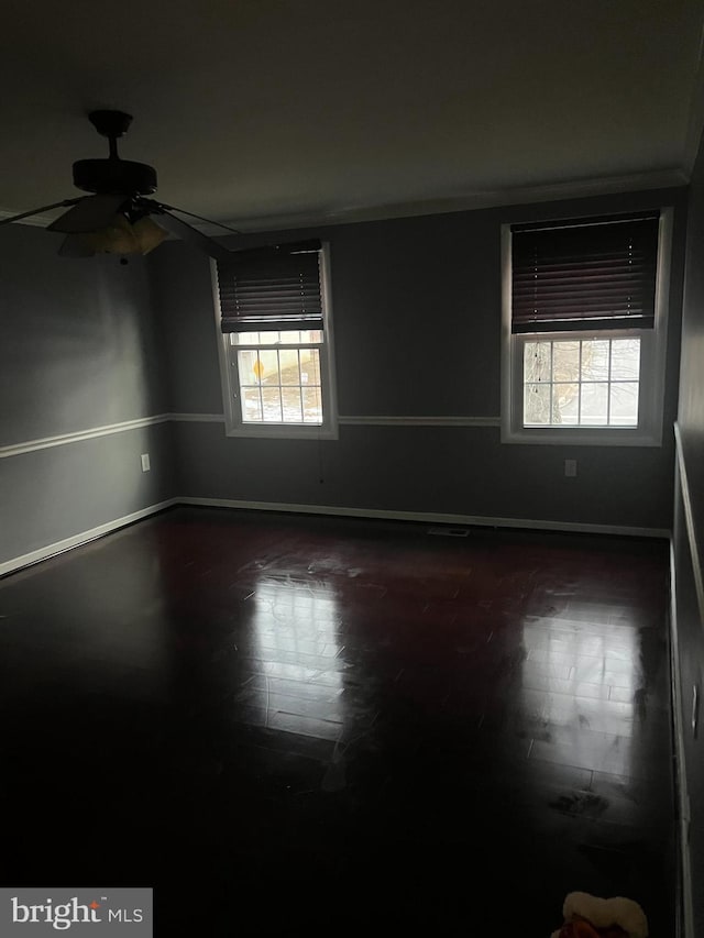 9429 Fairhaven Ave, Upper Marlboro, MD 20772 - unfurnished room featuring dark wood-type flooring and ceiling fan