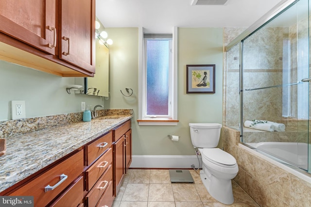 full bathroom featuring shower / bath combination with glass door, vanity, toilet, and tile patterned flooring