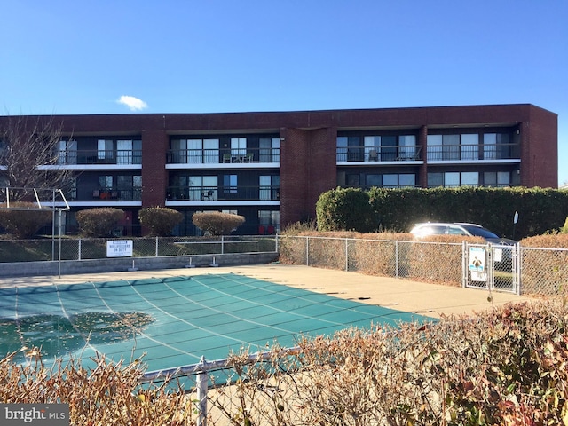 exterior space with a pool