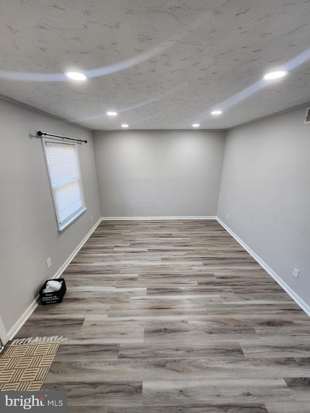 unfurnished room featuring light hardwood / wood-style flooring