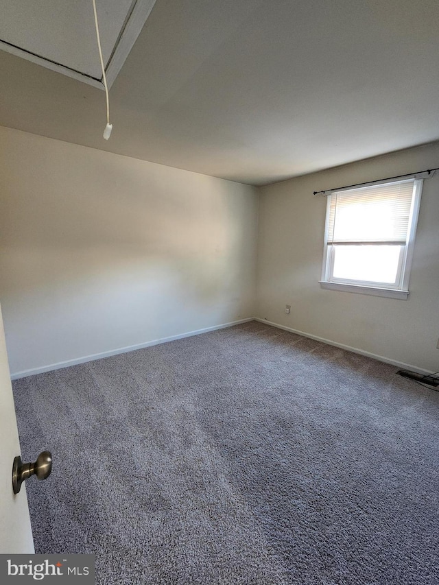 spare room with carpet flooring