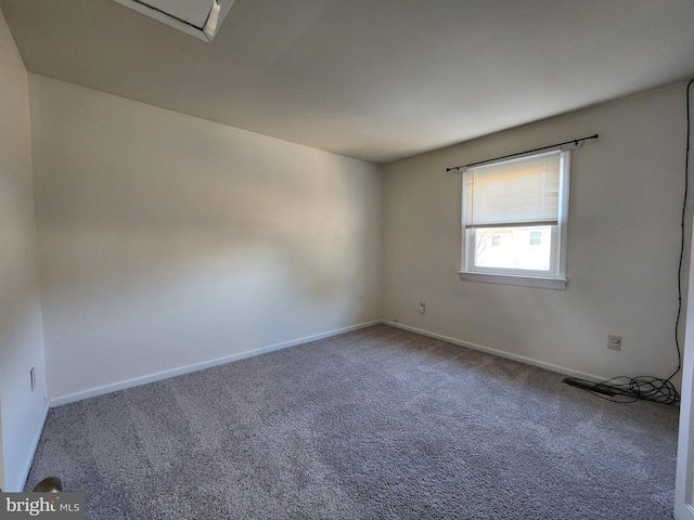 empty room with carpet flooring