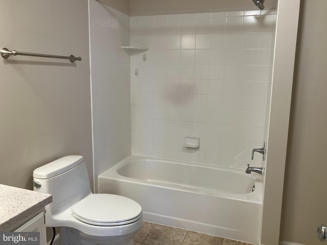 full bathroom featuring toilet, vanity, and bathtub / shower combination