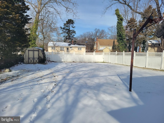 view of yard covered in snow