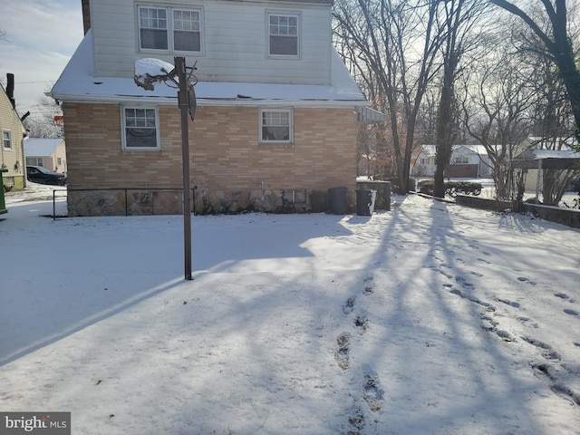 view of snow covered property