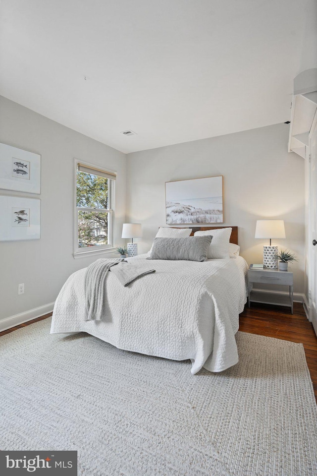 bedroom featuring hardwood / wood-style floors