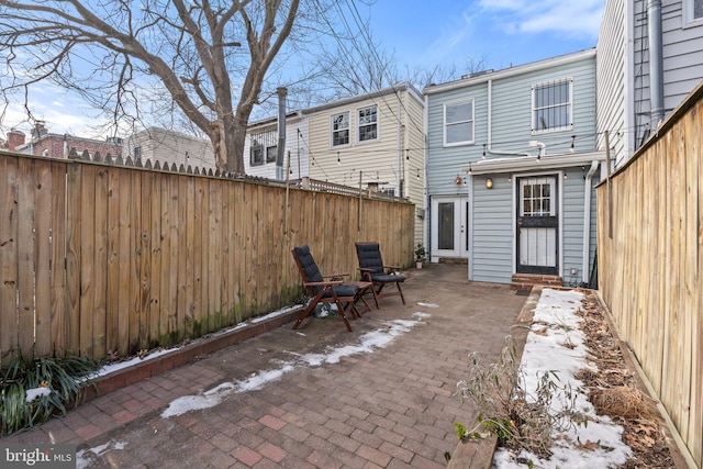 back of house with a patio area