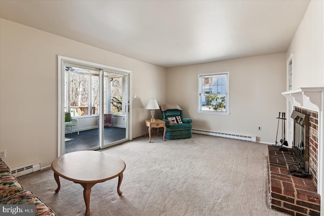 living area featuring carpet floors, a baseboard radiator, and a healthy amount of sunlight