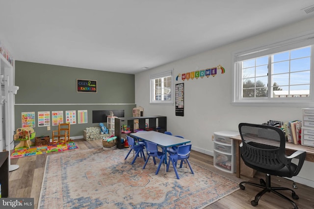 office featuring hardwood / wood-style floors and plenty of natural light