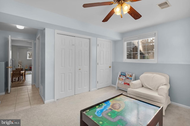 rec room with light carpet