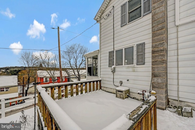 view of snow covered deck