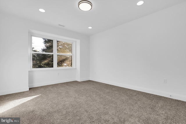 view of carpeted spare room