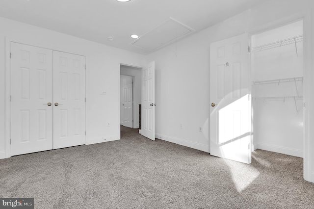 unfurnished bedroom with carpet flooring