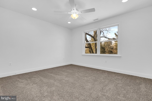 carpeted empty room with ceiling fan