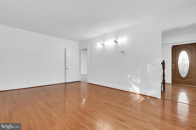 entrance foyer with light hardwood / wood-style floors