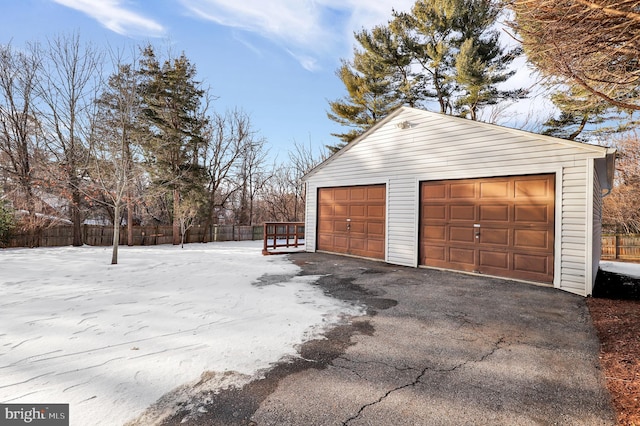 view of snow covered garage