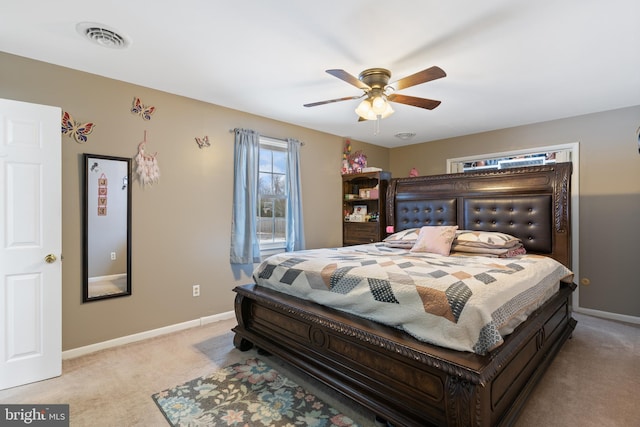 carpeted bedroom featuring ceiling fan