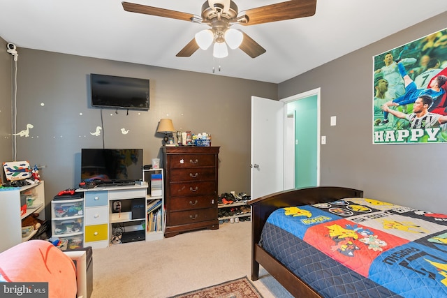 bedroom featuring ceiling fan and carpet flooring