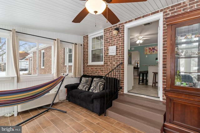 sunroom / solarium featuring radiator