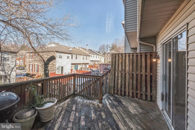 wooden terrace with area for grilling