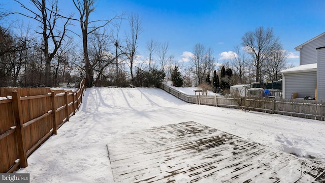 view of yard covered in snow