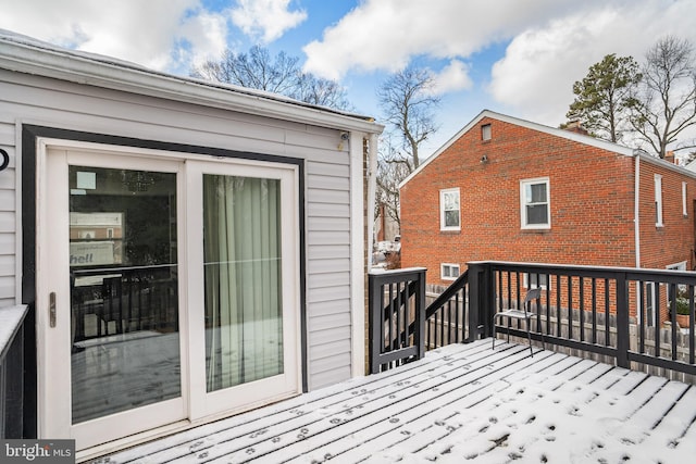 view of snow covered deck