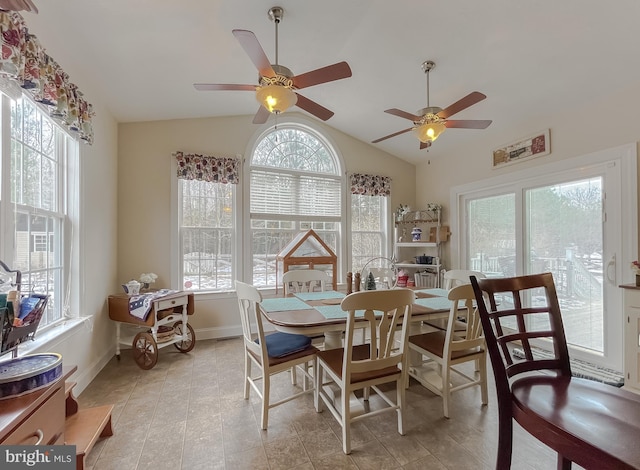 dining room featuring vaulted ceiling and ceiling fan