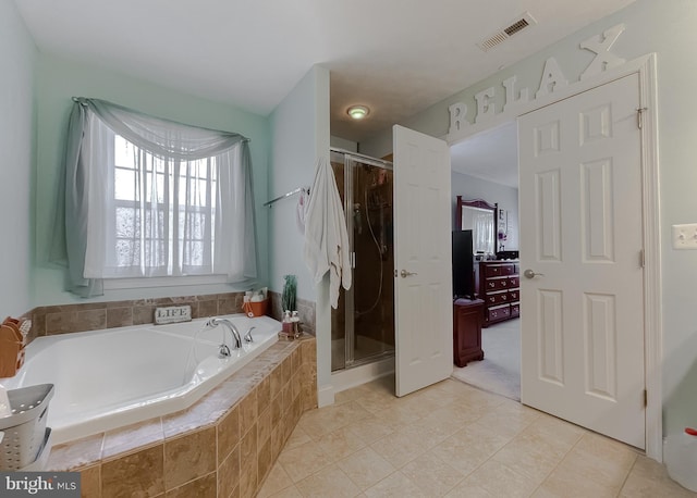 bathroom featuring tile patterned floors and plus walk in shower