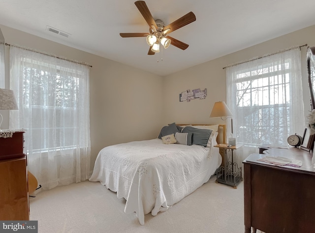 bedroom with carpet floors and ceiling fan