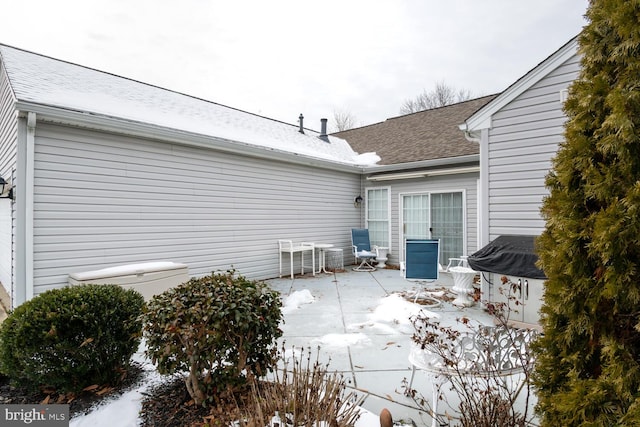 view of snow covered patio