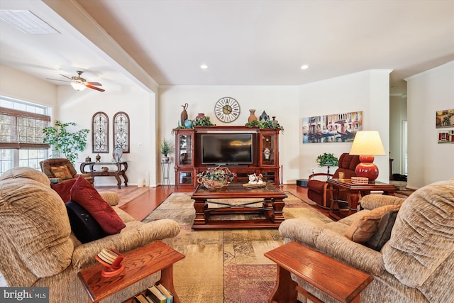 living room featuring ceiling fan