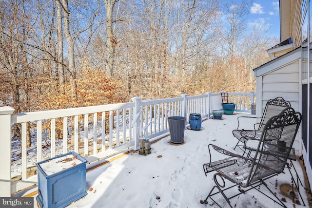 view of snow covered patio