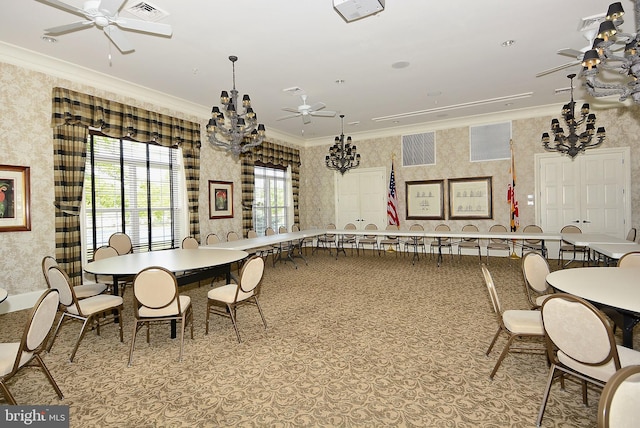 dining space featuring ceiling fan and ornamental molding