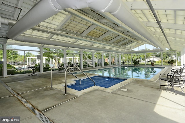 view of swimming pool with a patio area